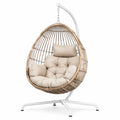 Fauteuil suspendu en rotin beige avec support en acier, style bohème, dimensions 110x110x195 cm, par Abrenvo.